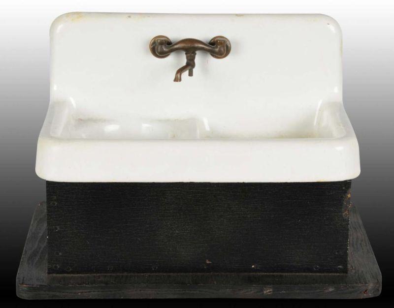 Appraisal: Salesman Sample Double Porcelain Sink Faucet Description Has faucet and