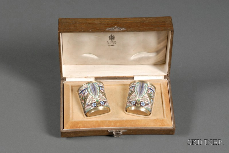 Appraisal: Pair of Boxed Faberge Goldwashed Silver and Enamel Beakers Moscow