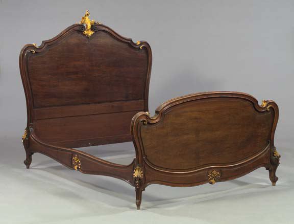 Appraisal: Louis XV-Style Mahogany Bed early th century the shaped paneled