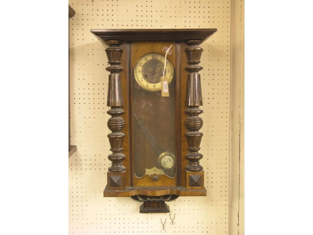 Appraisal: A th century German wall clock with grid-iron pendulum gong-striking