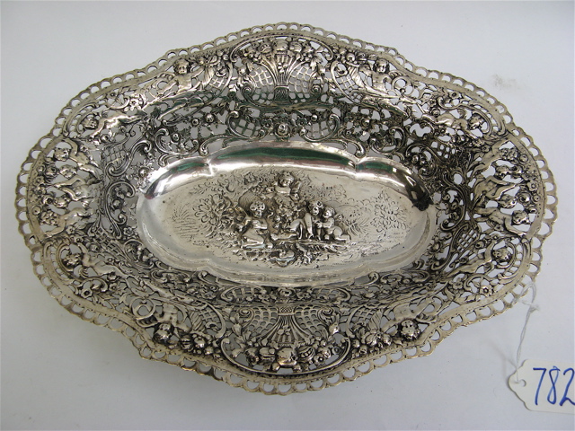 Appraisal: GERMAN STERLING SILVER FOOTED OVAL BOWL pierced chased and engraved