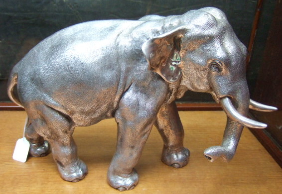 Appraisal: A silver figure of an elephant filled Sheffield cm high