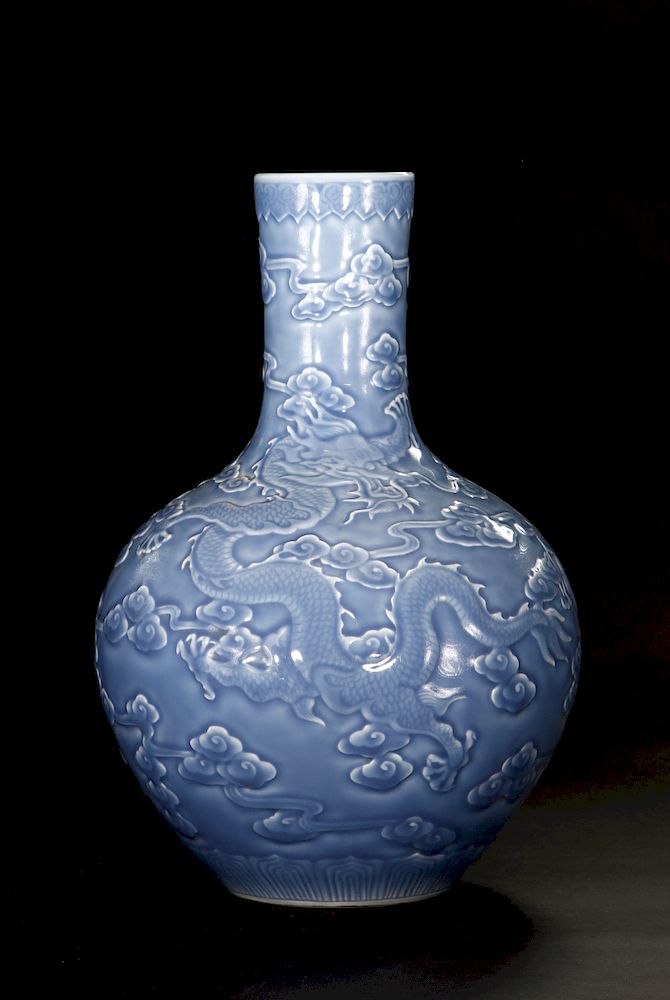 Appraisal: Sky-Blue Carved 'Dragon' Bottle Vase Chien-Lung The well-potted globular body