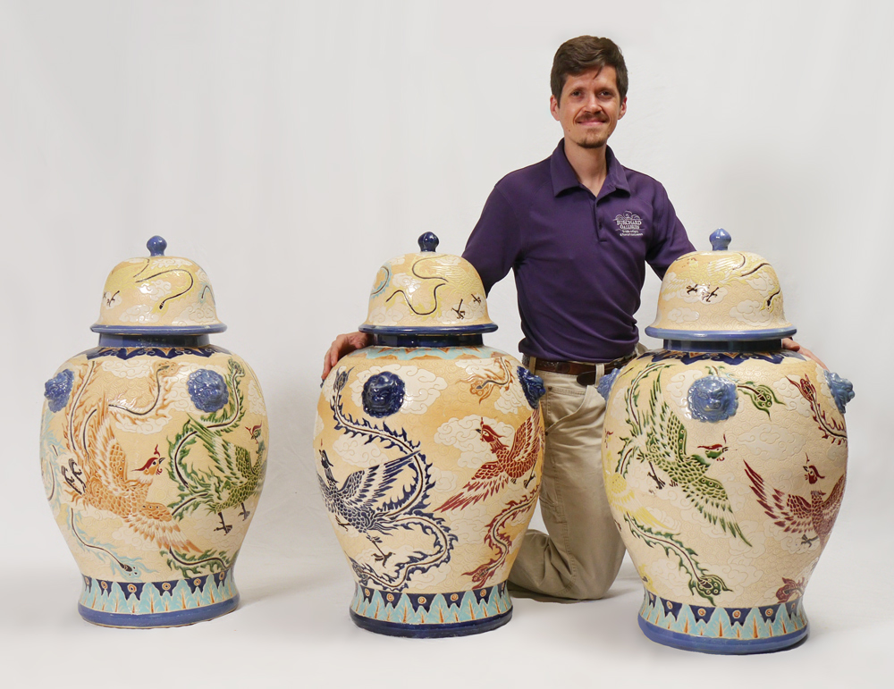 Appraisal: LARGE DECORATIVE COVERED TEMPLE JARS Incised polychrome birds in clouds