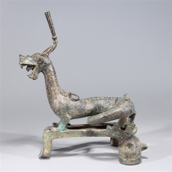 Appraisal: Chinese archaistic bronze dragon statue with allover incised calligraphy overall