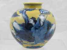 Appraisal: A Chinese vase with blue figures on a yellow ground