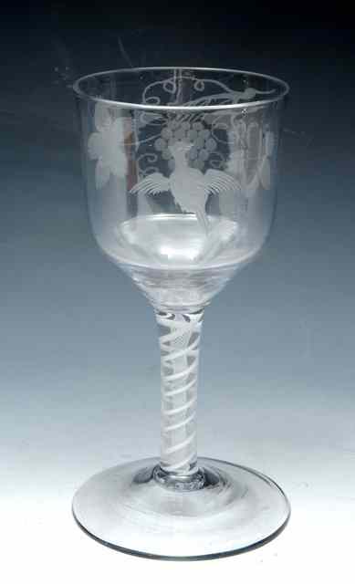 Appraisal: A GOBLET ogee bowl engraved with bird and fruiting vine