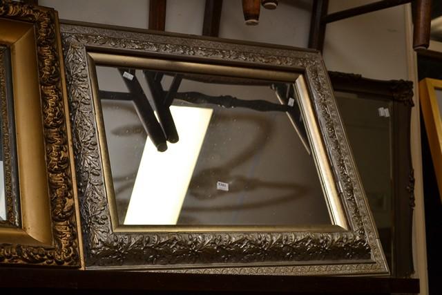 Appraisal: AN ORNATE SILVER FRAME WALL MIRROR AN ORNATE SILVER FRAME