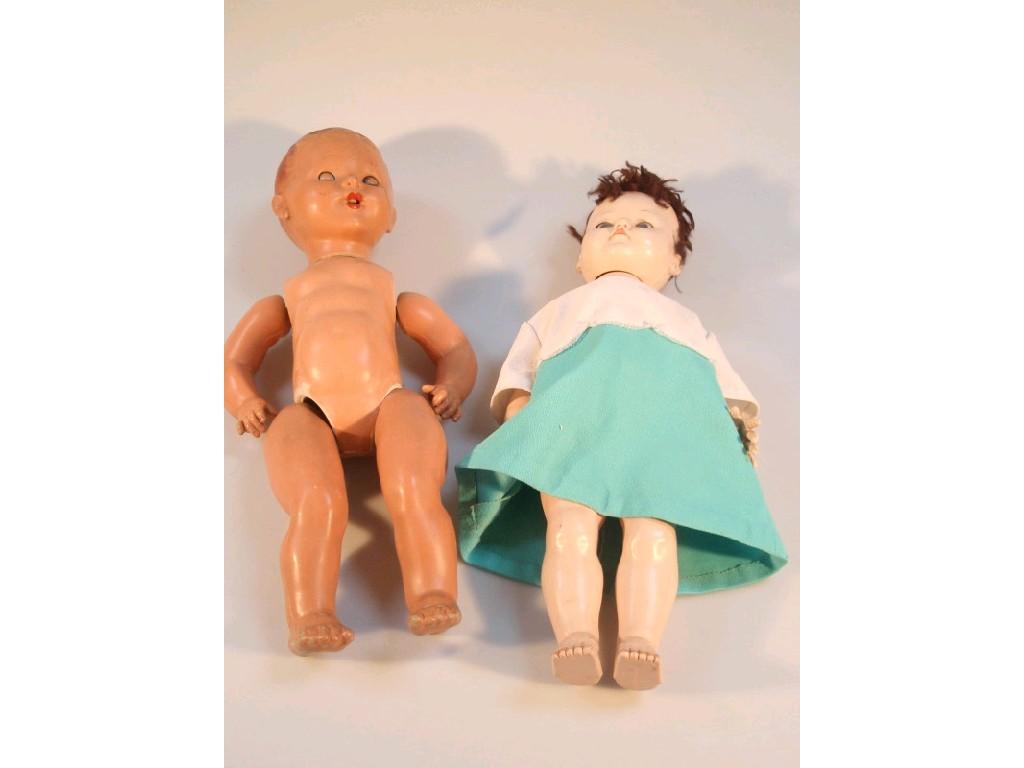 Appraisal: A Roddy plastic walking doll and another with composition body