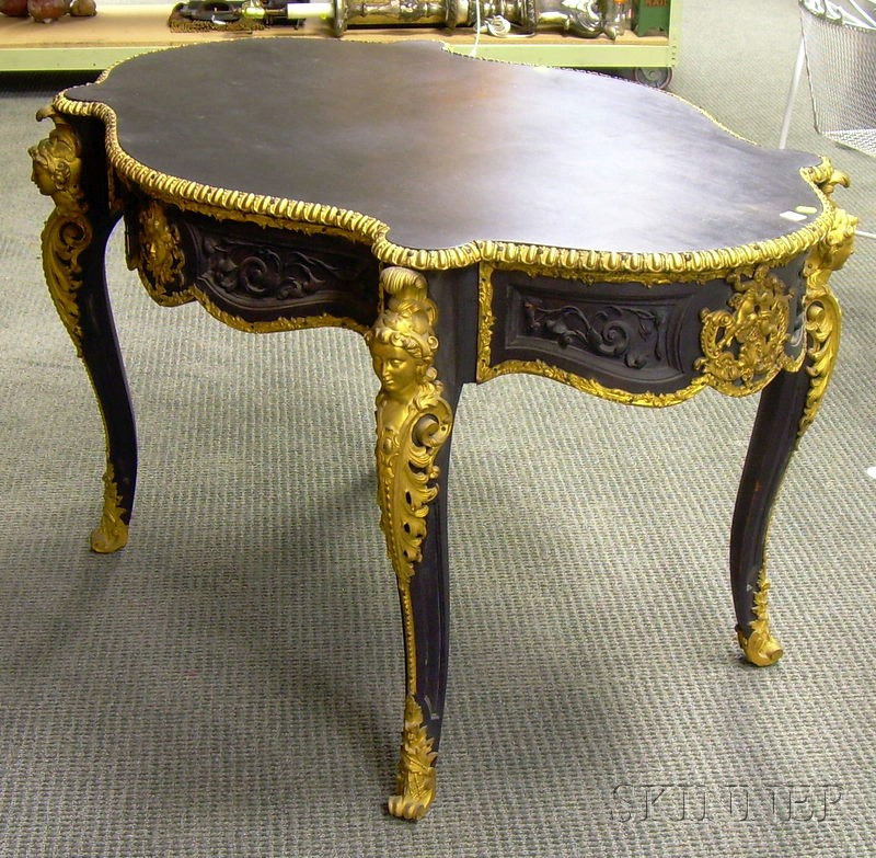 Appraisal: Louis XVI Style Turtle-top Gilt-ormolu Mounted Ebonized Carved Wood Center