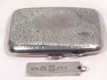 Appraisal: An engraved silver cigarette case together with a silver ingot