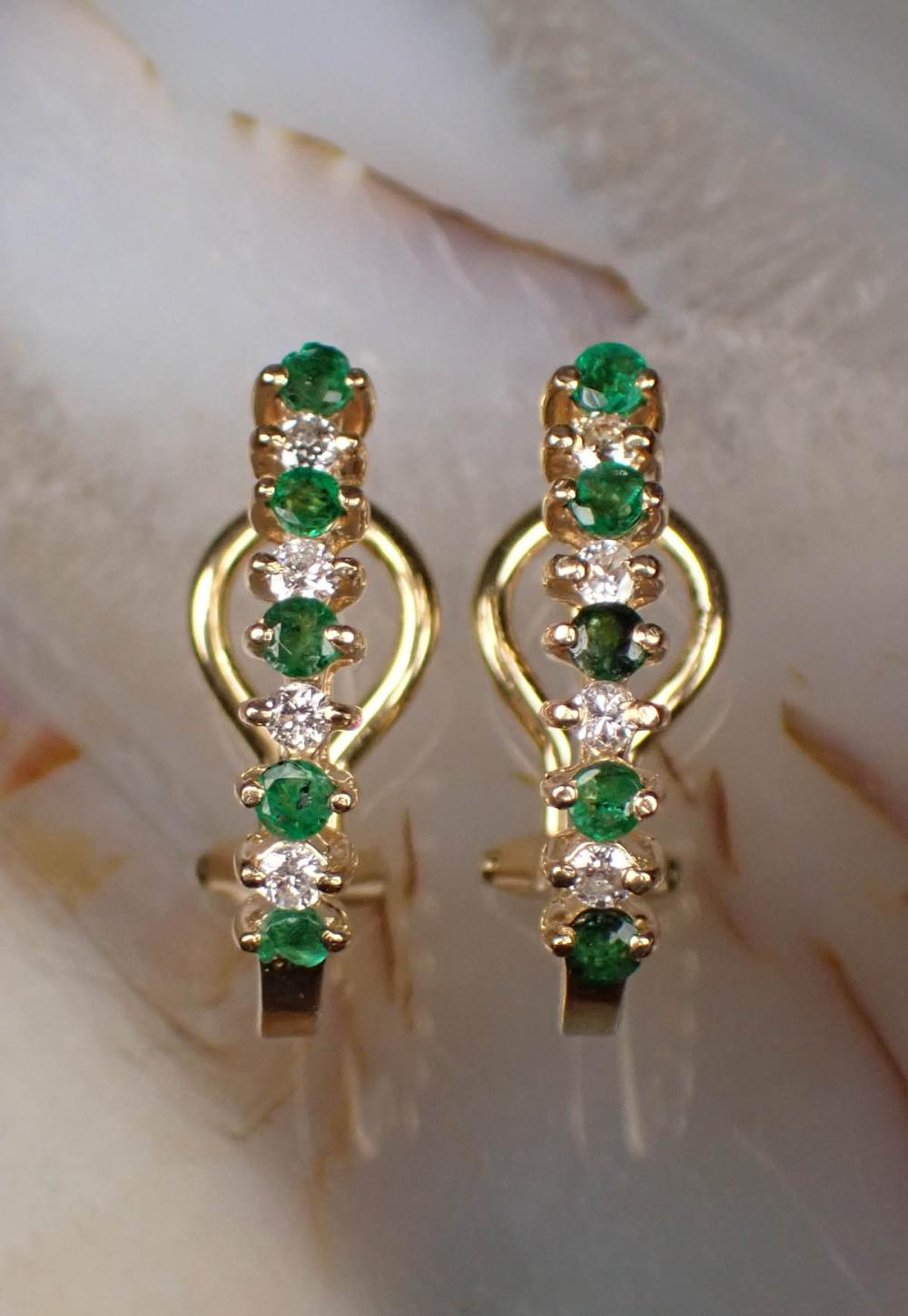 Appraisal: PAIR OF EMERALD AND DIAMOND EARRINGS each k yellow gold