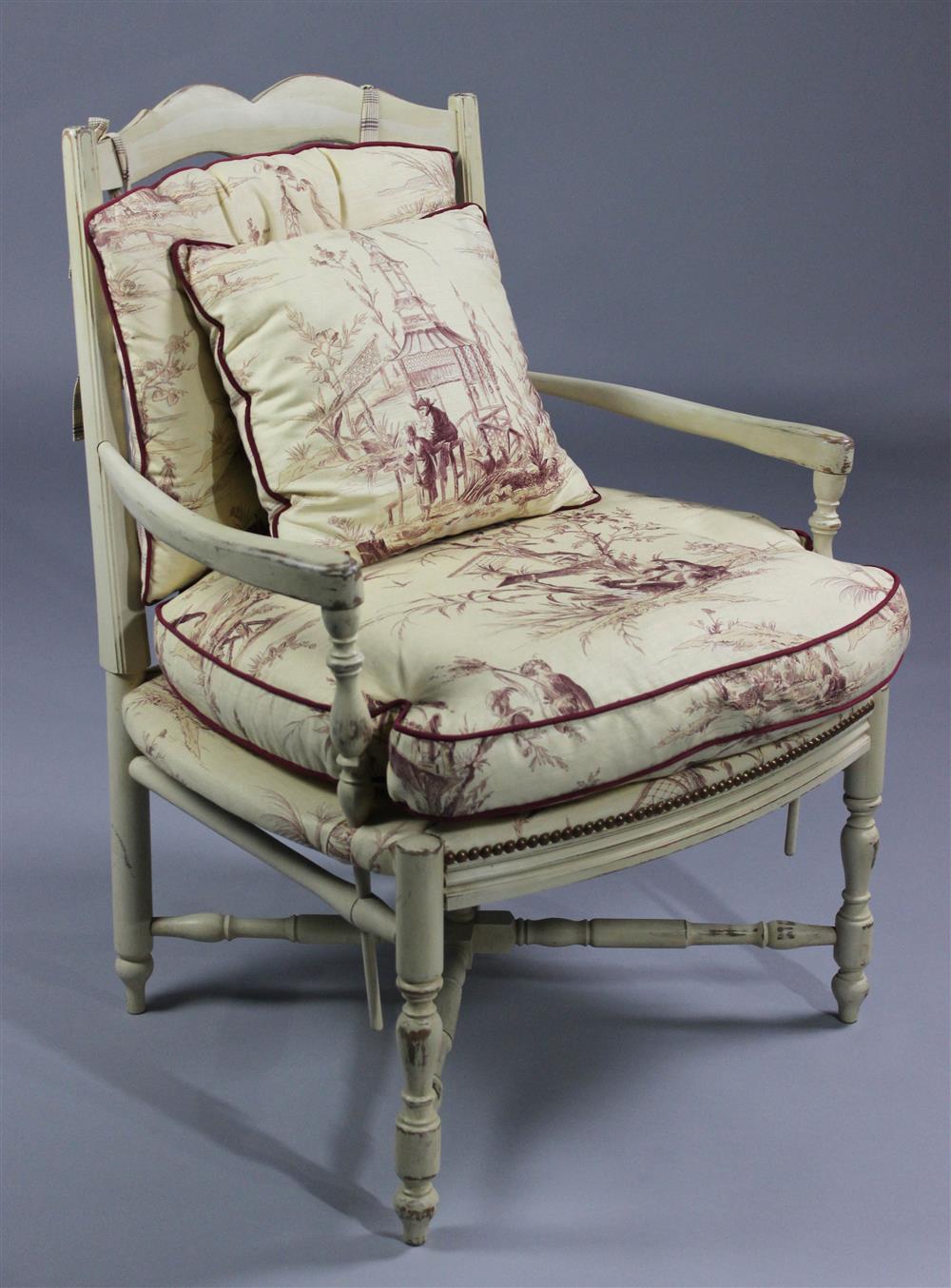 Appraisal: FRENCH COUNTRY STYLE ARMCHAIR UPHOLSTERED IN TOILE WITH MATCHING PILLOW