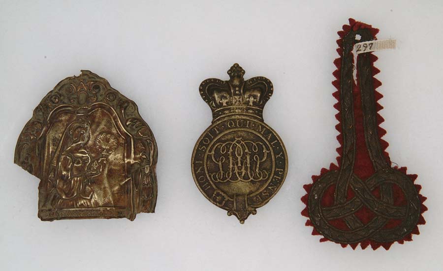 Appraisal: LOT OF THREE EARLY MILITARY INSIGNIA This lot consists of