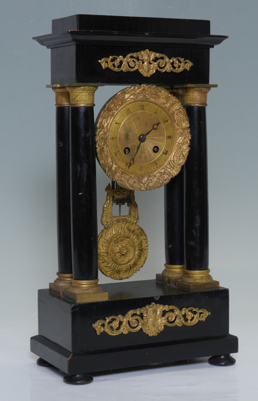 Appraisal: FRENCH EBONIZED WOOD PORTICO CLOCK Ebonized wood pediment columns and