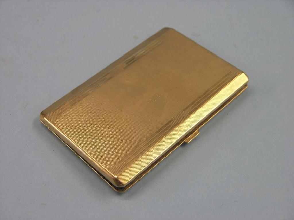 Appraisal: An Art Deco ct gold cigarette case with engine-turned detail