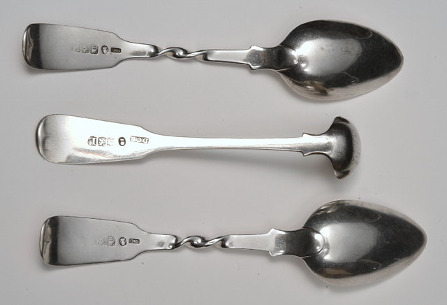 Appraisal: A PAIR OF SCOTTISH SILVER TEASPOONS fiddle pattern with twisted