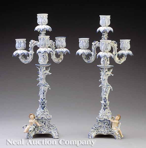 Appraisal: A Pair of German Blue-and-White Porcelain Four-Light Figural Candelabra late