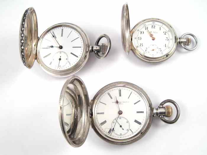 Appraisal: THREE ENGRAVED SILVER HUNTER CASE POCKET WATCHES A Non-magnetic Watch