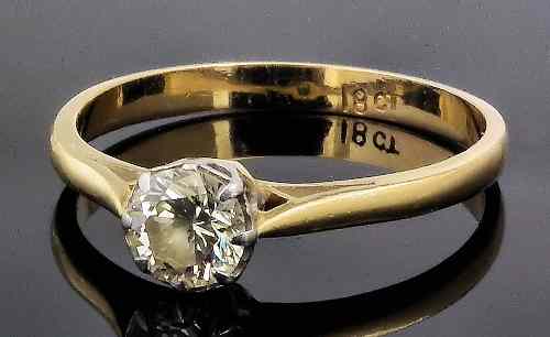 Appraisal: An ct gold mounted solitaire diamond ring set with an