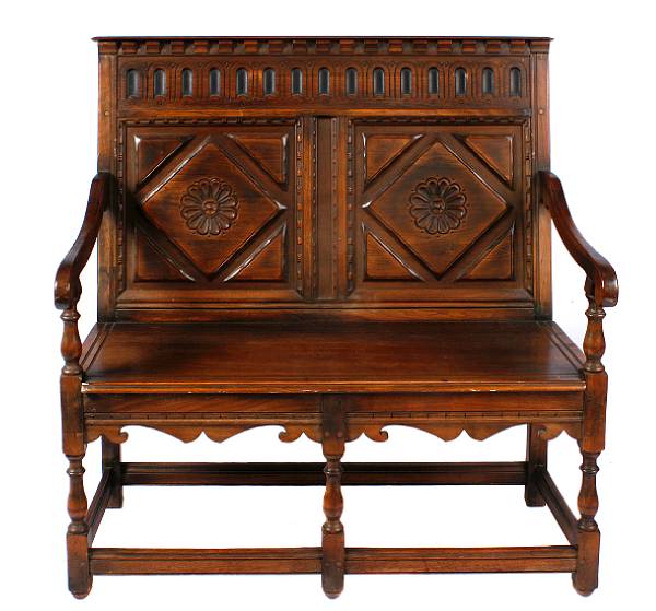 Appraisal: A Renaissance style walnut bench losses height in width in