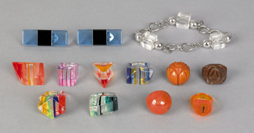 Appraisal: Seven Lucite rings six in rainbow colors and one with