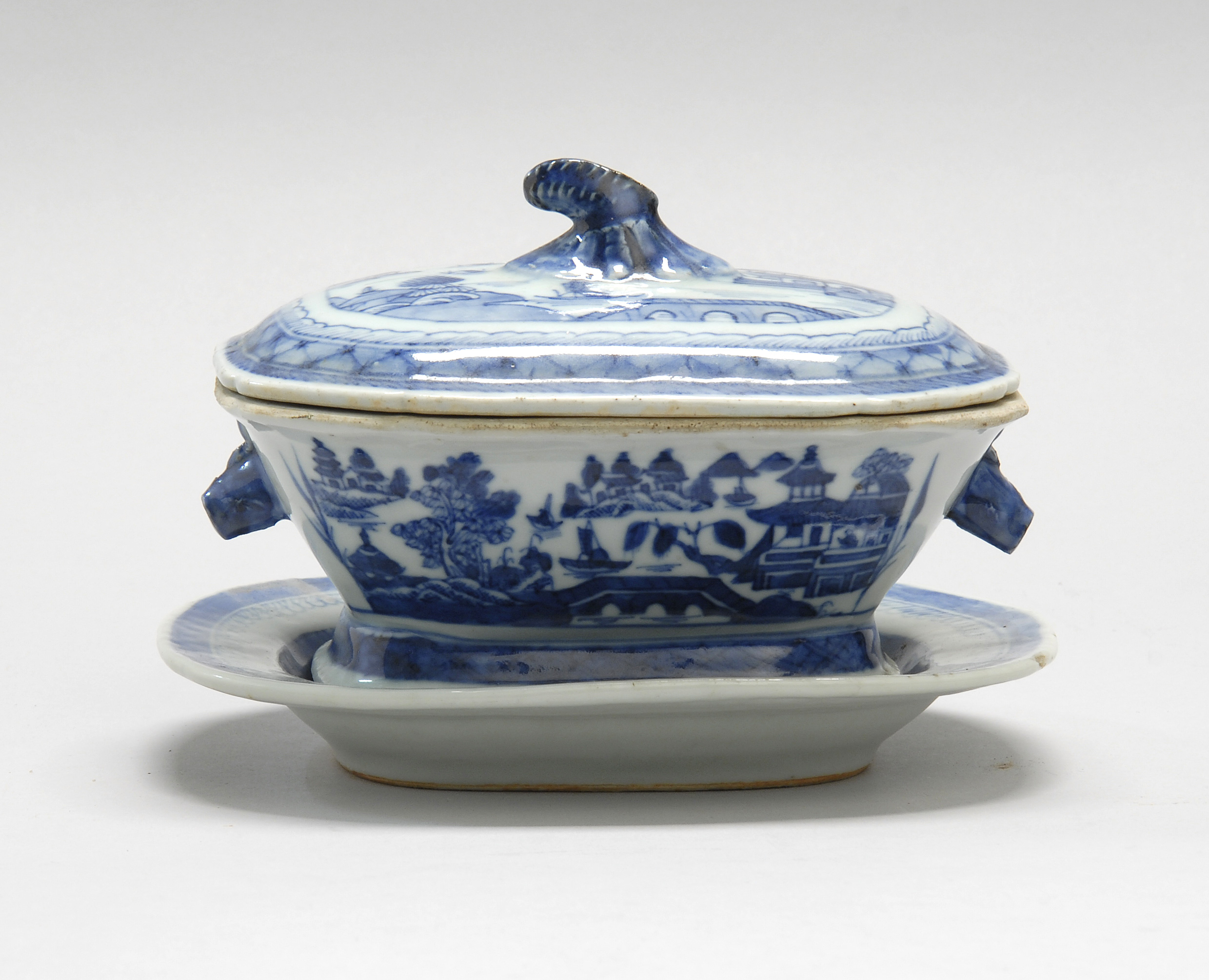 Appraisal: BLUE AND WHITE CANTON SAUCEBOAT WITH UNDERTRAY th CenturyIn modified