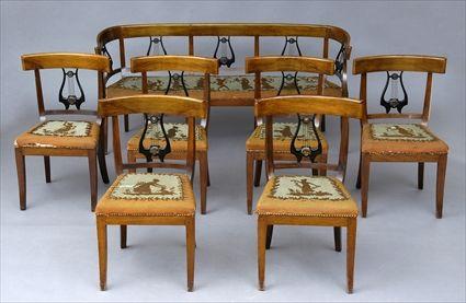 Appraisal: CONTINENTAL NEOCLASSICAL WALNUT SETTEE AND SIX MATCHING SIDE CHAIRS The