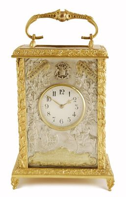 Appraisal: A rare presentation gilt brass and silver carriage clock with