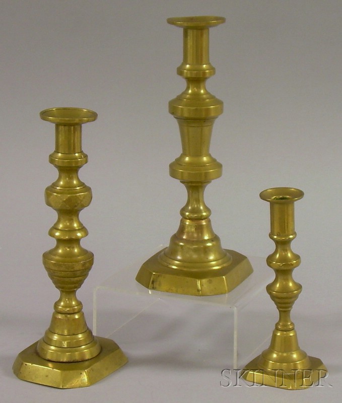 Appraisal: Three Mid- th Century Brass Candlesticks ht in