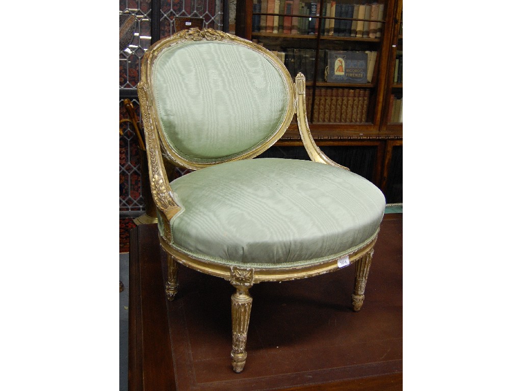 Appraisal: A th century French giltwood and upholstered salon tub chair