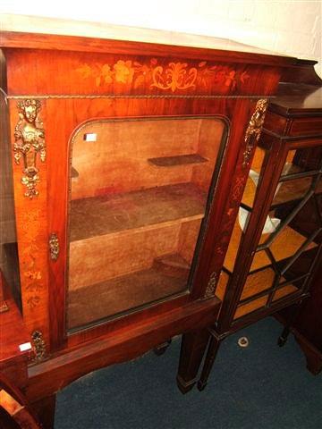 Appraisal: A Victorian walnut pier cabinet with gilt metal mounts and