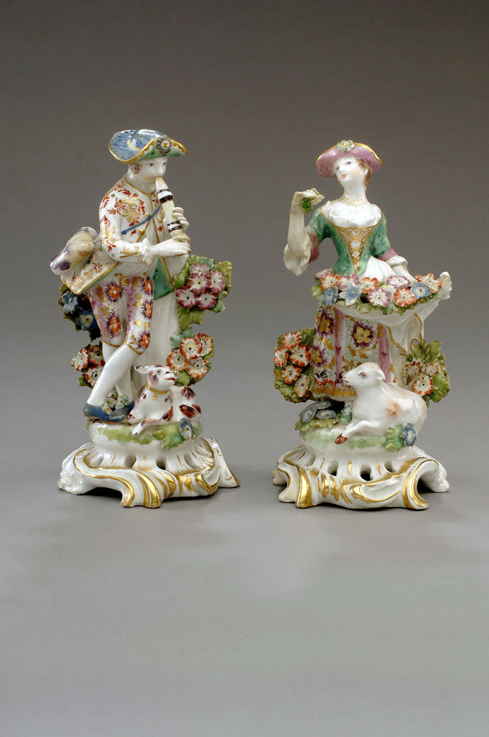 Appraisal: PAIR OF BOW PORCELAIN FIGURES OF A SHEPHERD AND SHEPHERDESS