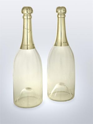 Appraisal: A pair of late Victorian mounted clear glass decanters in