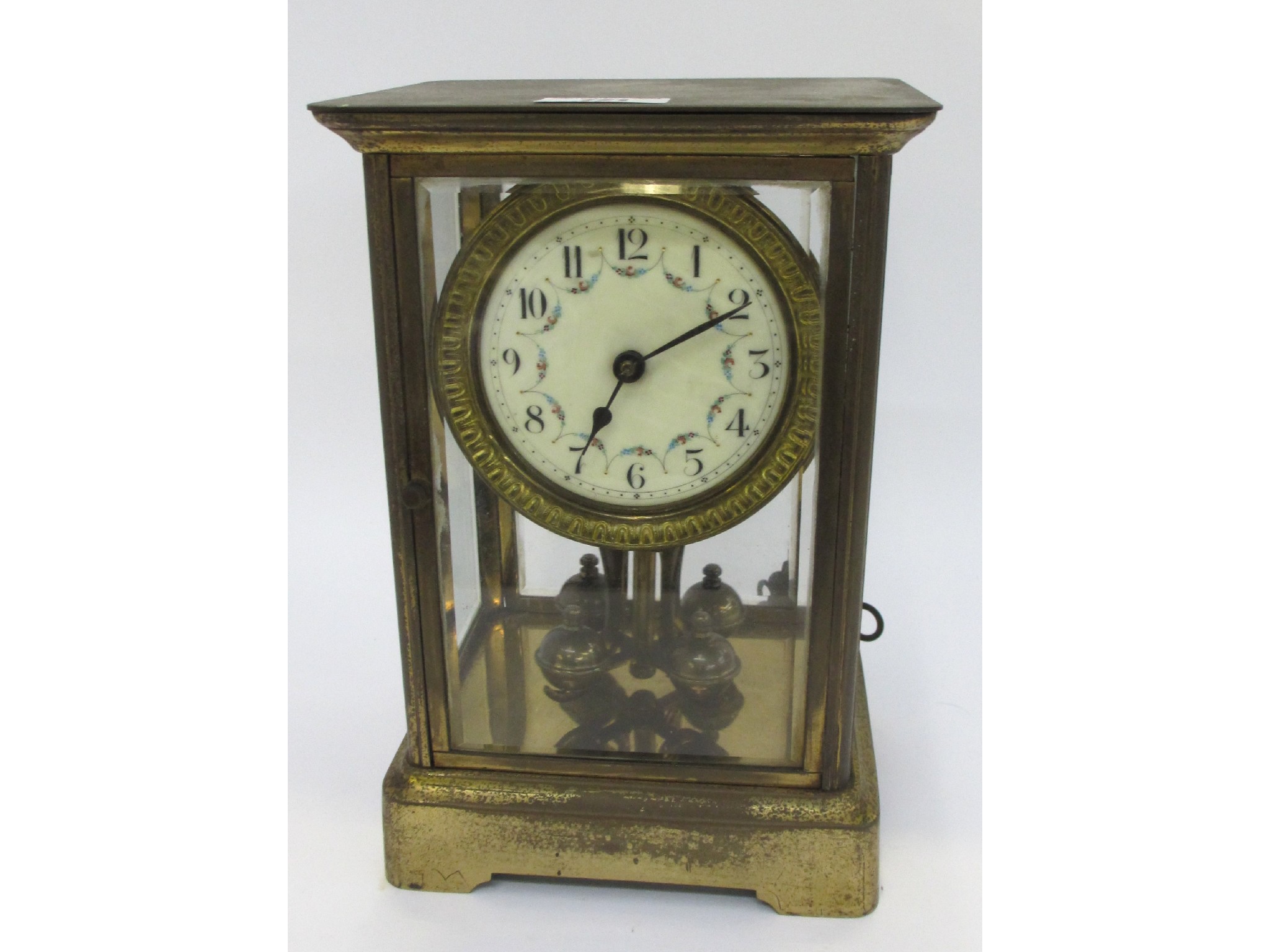 Appraisal: Brass four panel clock with floral decorated dial gilt worn