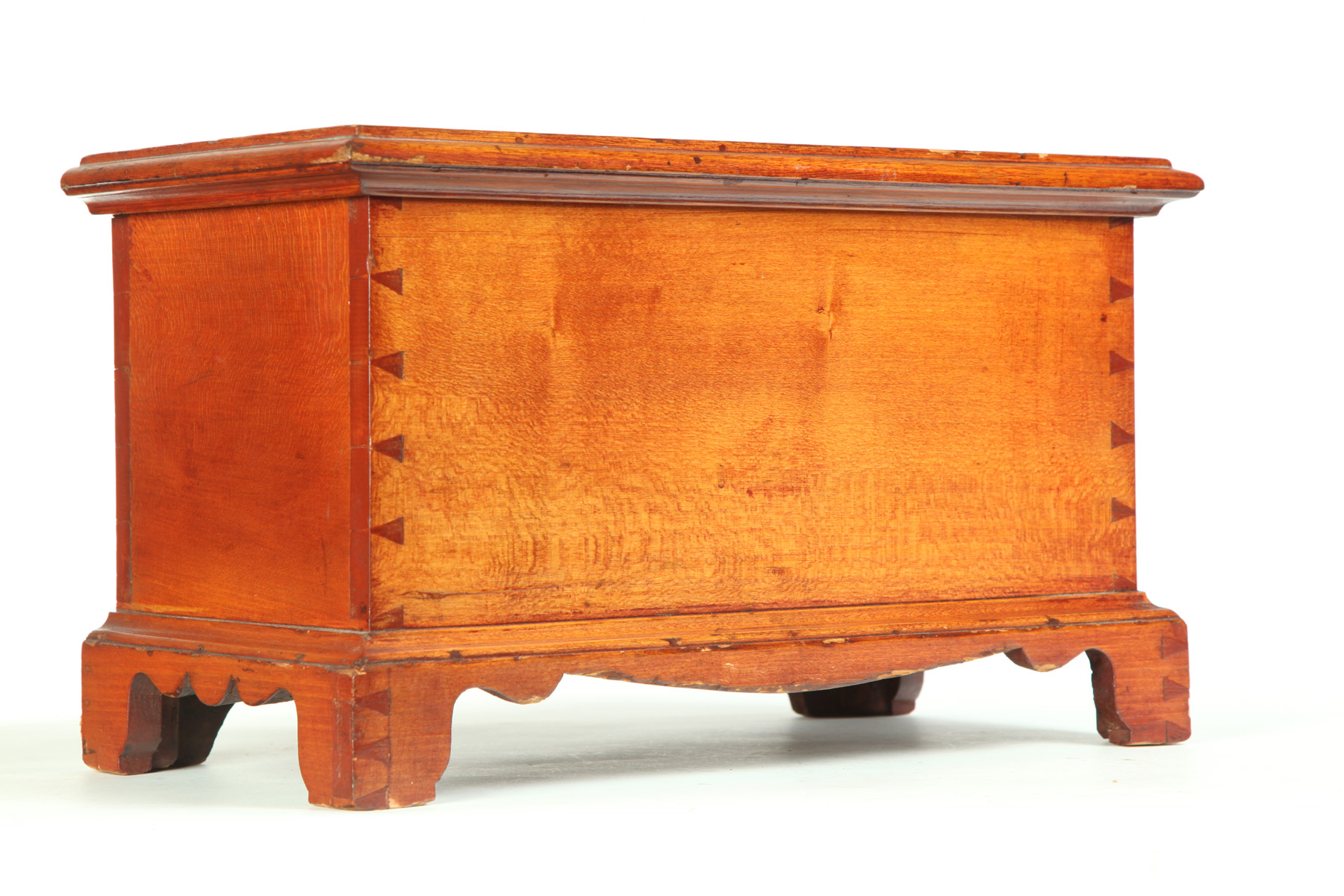 Appraisal: MINIATURE COUNTRY CHIPPENDALE BLANKET CHEST American early th century birch