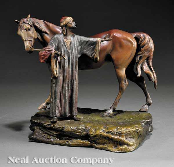 Appraisal: An Austrian Cold Painted Bronze Figural Group of a Man