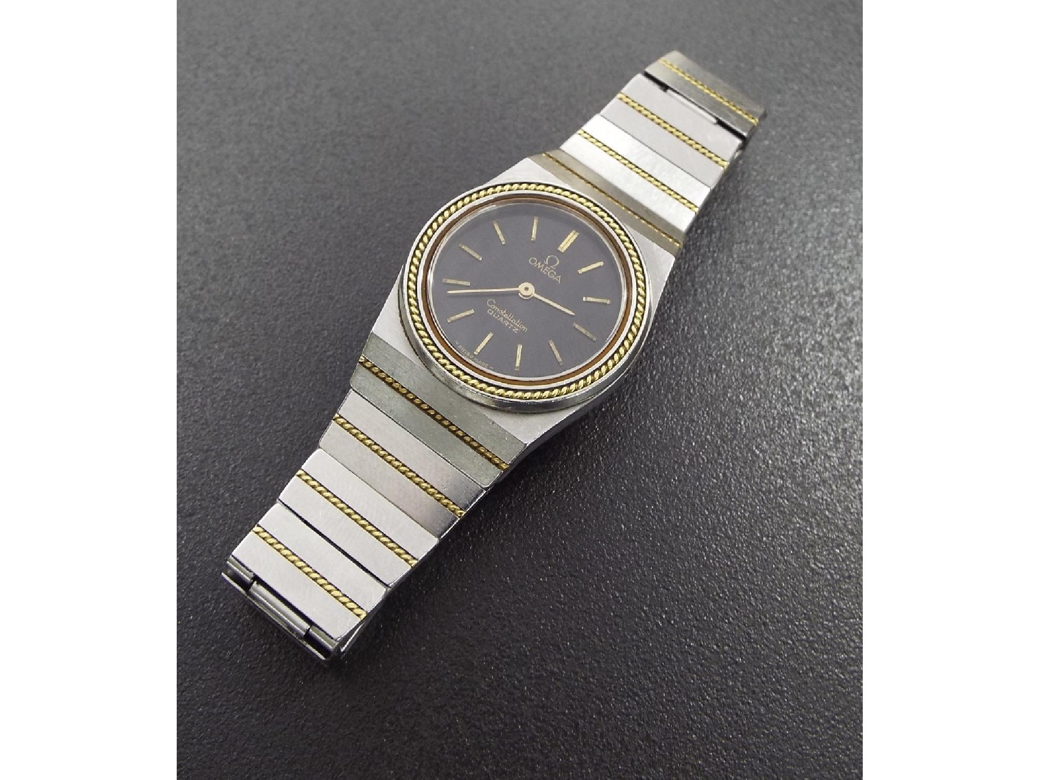 Appraisal: XWYFV Omega Constellation stainless steel and yellow gold push button