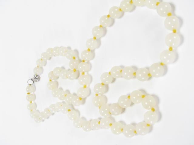 Appraisal: Yellow jade necklace long mm