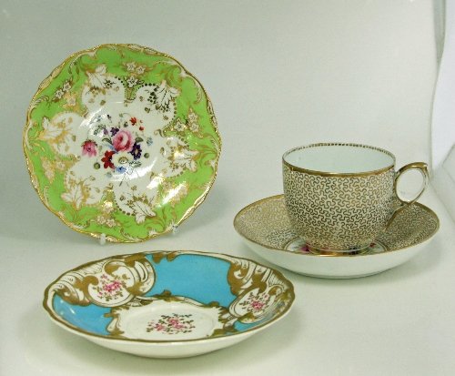 Appraisal: A Minton saucer painted bouquets of flowers in puce and