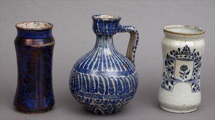 Appraisal: TWO MAJOLICA ALBERALLI AND A EWER The one copper luster