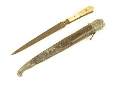 Appraisal: An Indo-Persian kard with a steel blade with a medial