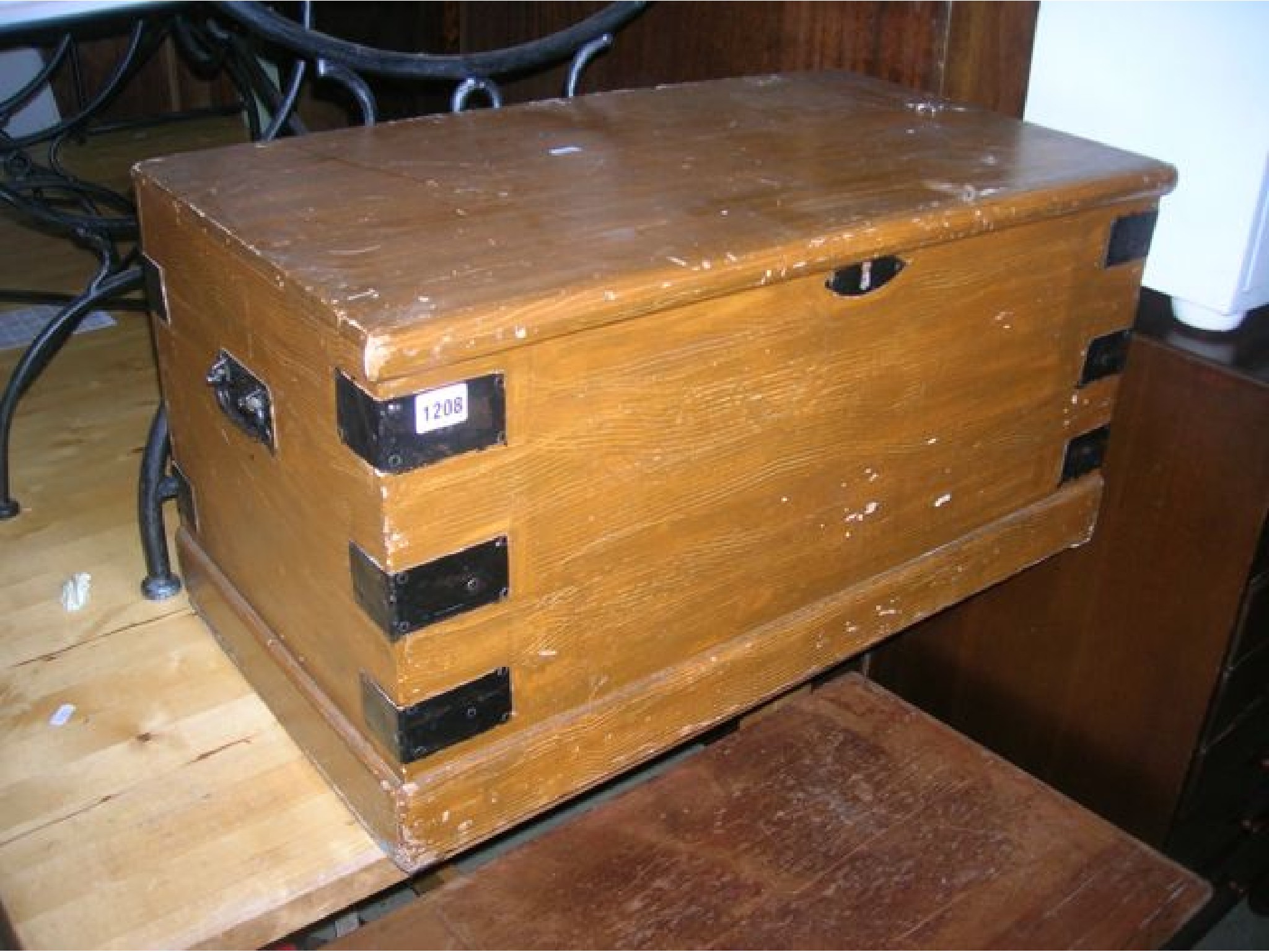 Appraisal: A small Victorian scumbled pine box with hinged lid iron