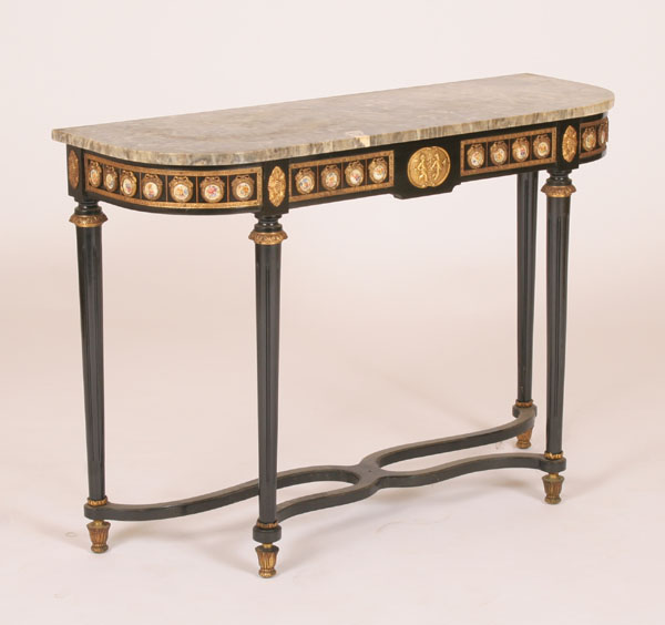 Appraisal: Ebonized French demilune table with marble top apron decorated with