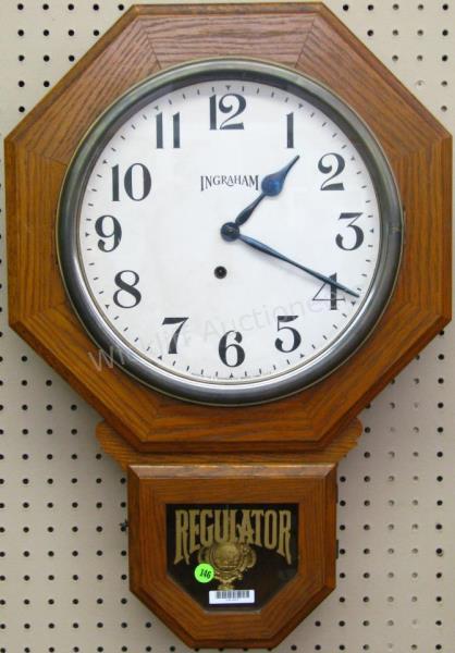 Appraisal: An antique oak Ingraham wall clock marked 'Regulator' on pendulum