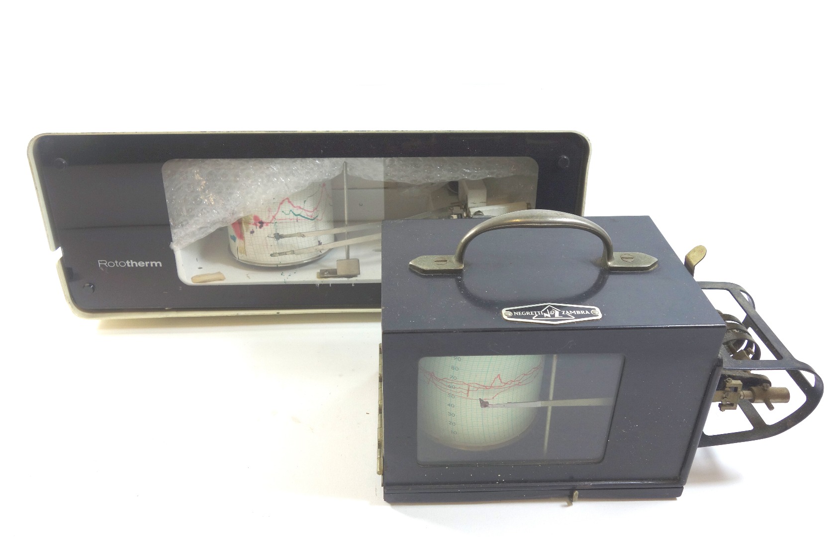 Appraisal: A Negretti Zambra Japanned metal cased barograph cm across and