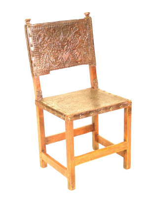 Appraisal: A walnut Portuguese chair with leather brass studded back and