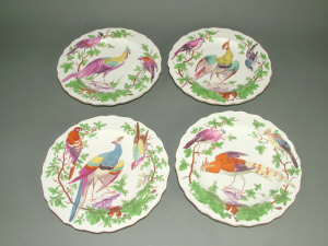 Appraisal: Set of four th century English porcelain dessert plates painted