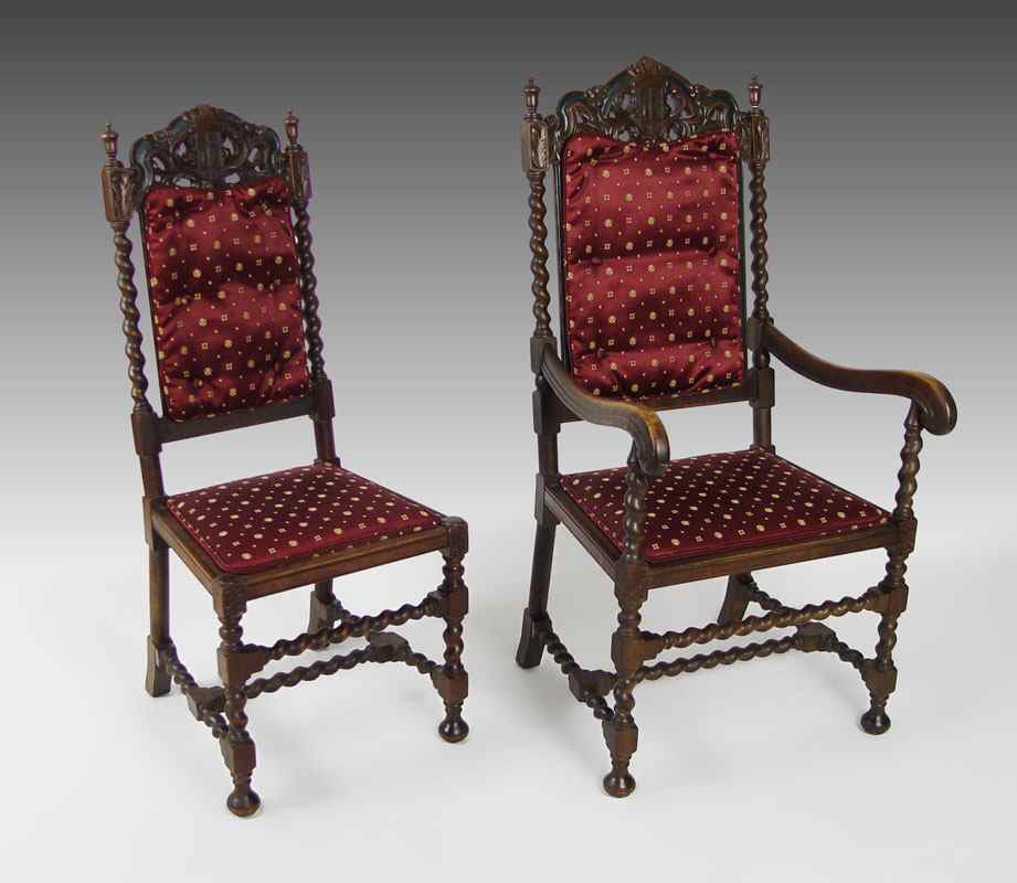 Appraisal: TWO BARLEY TWIST CHAIRS Carved back crest with heraldic shield