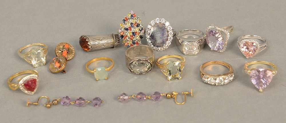 Appraisal: Large group of silver rings plus pair of carat gold